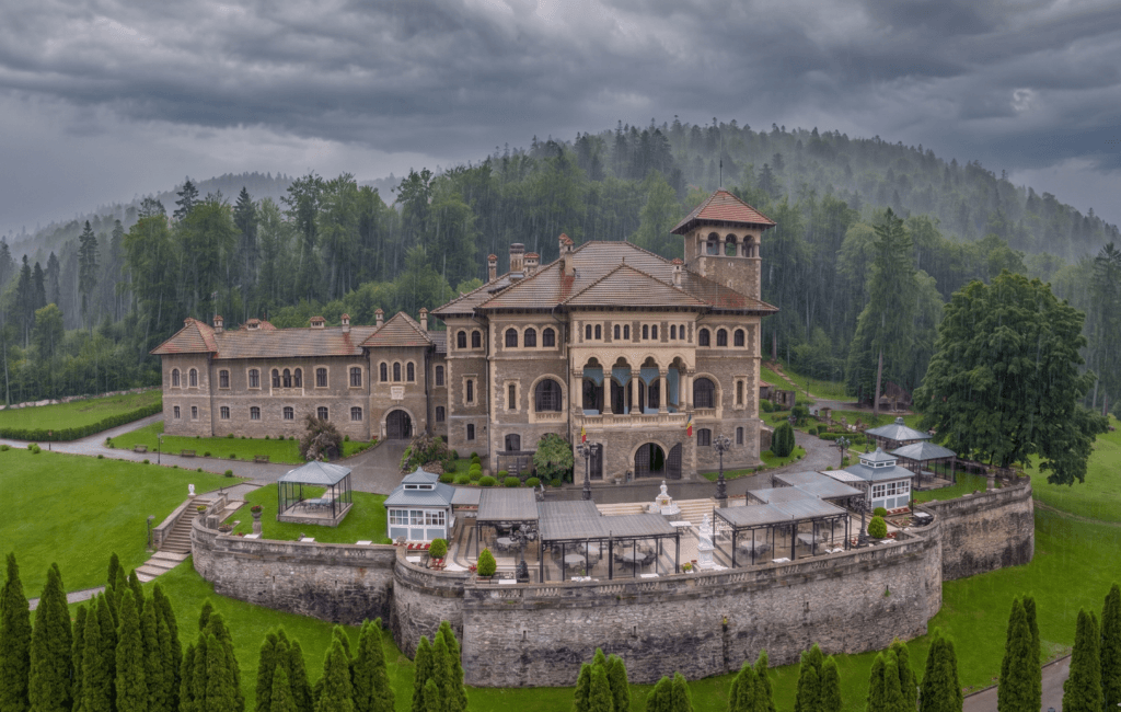 Cantacuzino Castle in mist, the Season 1 Wednesday filming location for Nevermore Academy